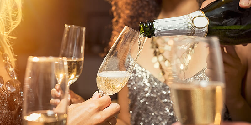 Pouring Champagne In Glass